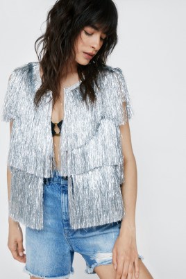 NASTY GAL Cropped Sleeveless Tinsel Jacket – silver fringed jackets – festival fashion – 70s inspired metallic clothes – womens 1970s style glam rock clothing