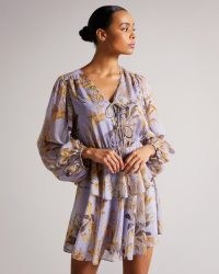 TED BAKER Gretia Printed Tie Front Mini Dress in Lilac / floaty balloon sleeve dresses / feminine botanical print fashion