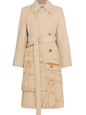 JW Anderson logo-print trench coat | women’s printed beige coats | FARFETCH womens designer outerwear | belted waist - flipped