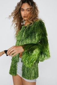 NASTY GAL Longline Tinsel Fringe Jacket Green – women’s fringed jackets – ideas for festival fashion – womens retro style clothes – 70s glam rock inspired clothing