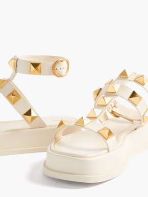 VALENTINO GARAVANI Roman Stud leather platform sandals | women’s white studded chunky sole summer shoes | womens designer ankle strap flatforms - flipped