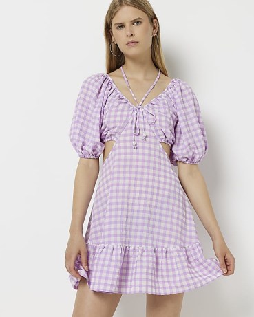 River Island PURPLE GINGHAM CUT OUT MINI DRESS – womens checked puff sleeved cotton dresses – tie neck detail fashion – women’s cutout clothes – tiered hem - flipped