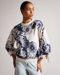 TED BAKER Sidnye Tie Cuff Top With Embellished Detailing in Ivory / sequinned floral tops