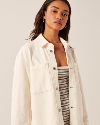 Abercrombie & Fitch Denim Shirt Jacket in Cream | curved hem overshirts | on-trend summer shackets | women’s casual fashion - flipped