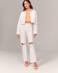 Abercrombie & Fitch Ultra High Rise 90s Straight Jeans in White Destroy | women’s ripped denim fashion