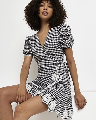 RIVER ISLAND BLACK BRODERIE WRAP MINI DRESS / women’s gingham and floral trim dresses / check print puff sleeved fashion / women’s fashionable summer clothes