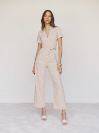 Reformation Cassidy Denim Jumpsuit in Almond | short sleeve belted ankle length jumpsuits | tie waist belt | casual all-in-one fashion | stylish no fuss clothes