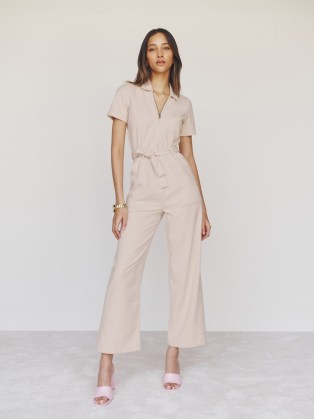 Reformation Cassidy Denim Jumpsuit in Almond | short sleeve belted ankle length jumpsuits | tie waist belt | casual all-in-one fashion | stylish no fuss clothes - flipped