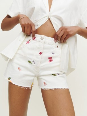 Reformation Charlie High Rise Jean Short in Ladybugs / women’s white denim embroidered shorts / raw hem / insect embroidery - flipped