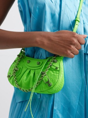 BALENCIAGA Cagole mini croc-effect leather shoulder bag ~ bright green crocodile embossed baguette shaped bags ~ small designer 90s inspired handbags ~ 1990s style chain strap handbag ~ women’s accessories at MATCHESFASHION - flipped