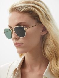 CARTIER EYEWEAR Santos de Cartier aviator metal sunglasses | womens chic aviators | women’s designer eyewear | gold tone rim with green lenses | MATCHESFASHION