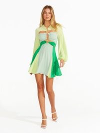 alice McCALL IN TULUM MINI DRESS in CLOVER | floaty cut out party dresses | feminine balloon sleeve fit and flare | open back detail evening fashion | colour block occasion clothes