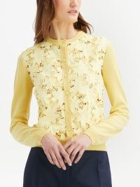 Oscar de la Renta floral-embroidered knitted cardigan banana yellow | guipure lace panelled cardigans | women’s designer knitwear at FARFETCH | feminine ladylike knits