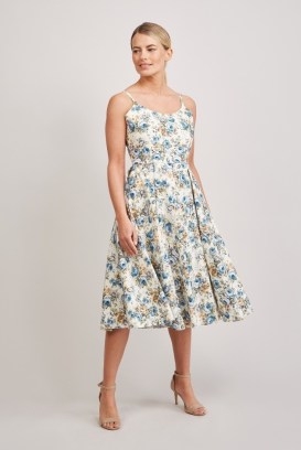 The Pretty Dress Company – PRISCILLA DARLING ROSE MIDI DRESS – Fully lined with cotton lining with slight stretch for comfort – Bias cut bodice with slight stretch – Adjustable straps – Signature midi circle skirt with pleats and pockets – Concealed centre back zip - flipped