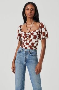 ASTR THE LABEL TIE NECK ABSTRACT CUT OUT PUFF SLEEVE TOP | sweetheart neckline tops | puffed sleeves | fitted bodice