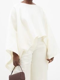 THE ROW Dalel oversized cape-sleeve duchess-silk top ~ voluminous wide sleeved ivory tops ~ women’s minimalist clothes ~ understated fashion ~ MATCHESFASHION