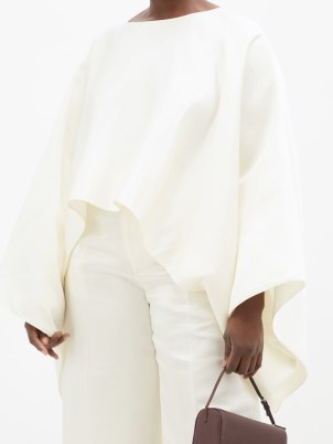 THE ROW Dalel oversized cape-sleeve duchess-silk top ~ voluminous wide sleeved ivory tops ~ women’s minimalist clothes ~ understated fashion ~ MATCHESFASHION - flipped