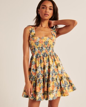 Abercrombie & Fitch Smocked Bodice Easy Mini Dress in multifloral / floral print ruffled shoulder strap fit and flare dresses / tiered hem