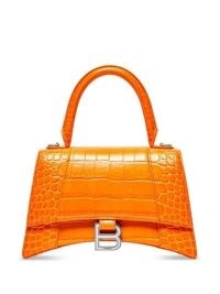 Balenciaga small Hourglass top-handle bag in pop orange / bright leather crocodile embossed bags / luxe croc effect handbags / FARFETCH