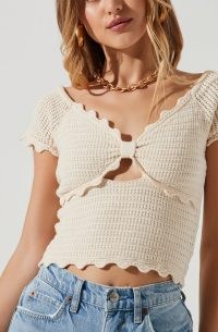 BECKER CROCHET FRONT CUTOUT SHORT SLEEVE TOP in Cream | feminine cut out scallop trim tops | gorgeous scalloped edge knitwear | women’s knitted fashion