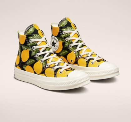 Converse Chuck 70 Lemons – High-top sneaker with canvas upper – OrthoLite cushioning for all-day comfort – All-over lemon prints for summer-ready style – Shiny, taller rubber sidewall and winged tongue stitching – Heritage details like a 1970’s heel logo nod to its legacy - flipped