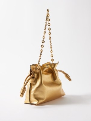 LOEWE Flamenco mini metallic-leather clutch bag in gold ~ luxe chain strap shoulder bags ~ luxury designer handbags ~ slouchy drawstring handbag ~ MATCHESFASHION - flipped