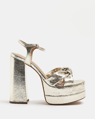 RIVER ISLAND GOLD WIDE FIT KNOT PLATFORM HEELS ~ chunky metallic party platforms ~ knotted retro evening shoes ~ women’s vintage style occasion sandals ~ high block heel - flipped