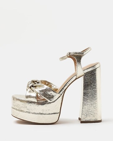 RIVER ISLAND GOLD WIDE FIT KNOT PLATFORM HEELS ~ chunky metallic party platforms ~ knotted retro evening shoes ~ women’s vintage style occasion sandals ~ high block heel