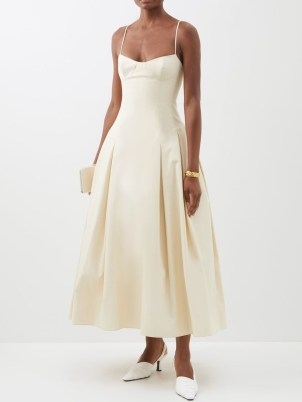 KHAITE Robyn pleated cotton-twill dress ~ ivory spaghetti strap fit and flare dresses ~ skinny shoulder straps ~ women’s designer occasion clothes ~ beautiful fashion ~ MATCHESFASHION ~ alternative bridal gowns - flipped