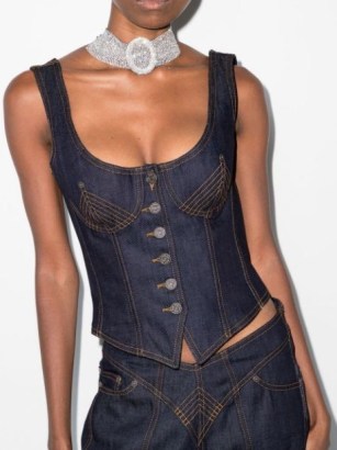 Jean Paul Gaultier button-fastening denim top | dark blue scoop neck corset style tops | sleeveless bustier top | lace up back detail | FARFETCH