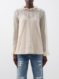 GUCCI Loved cotton-blend lace blouse in cream ~ sheer long sleeved ruffle trim blouses ~ camisole-lined tops ~ women’s feminine designer clothes ~ MATCHESFASHION ~ luxe slogan print fashion ~ frill neck and cuff detail