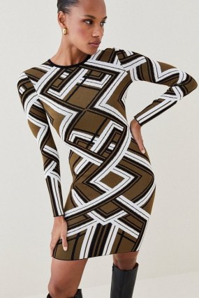 KAREN MILLEN Placement Stripe Jacquard Knit Pencil Midi Dress in Khaki – women’s long sleeved geo print dresses – bold geometric prints on womens clothes