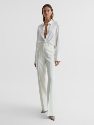 REISS TAITE FLARED TUXEDO TROUSERS WHITE | women’s tailored seamed pants | front pinched seams | womens chic flares