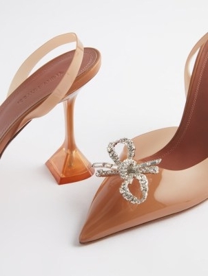 AMINA MUADDI Rosie 95 crystal-bow slingback PVC mules in tan ~ transparent pointed toe slingbacks ~ embellished event shoes ~ MATCHESFASHION ~ women’s luxe designer occasion pumps ~ martini glass style heels - flipped