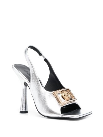 Versace Medusa 115mm sandals in Silver | metallic square toe high heel slingbacks | designer slingback occasion shoes | luxe party footwear | FARFETCH - flipped