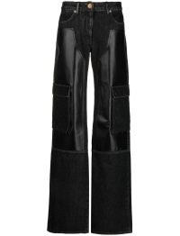 Versace panelled wide-leg jeans in black | women’s mixed denim and leather panel fashion | womens designer clothes | pocket detail