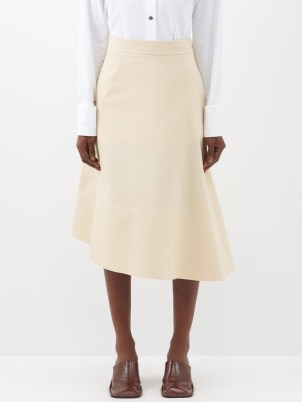JIL SANDER Asymmetric-hem gabardine midi skirt in beige ~ women’s asymmetrical designer clothes ~ MATCHESFASHION