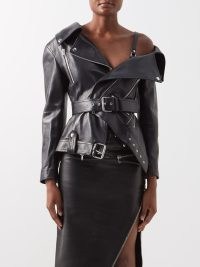 ALEXANDER MCQUEEN Asymmetric leather jacket in black | women’s biker inspired off shoulder jackets | womens designer zip, stud and buckle detail jackets | MATCHESFASHION