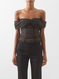 SELF-PORTRAIT Crystal-embellished off-the-shoulder fishnet top in black – romantic semi sheer bardot tops covered in crystals – romance inspired evening fashion – sweetheart neckline – glittering occasion clothes – matchesfashion