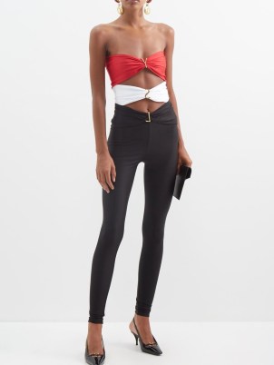 SAINT LAURENT YSL-plaque bandeau cutout jersey jumpsuit in black, white and red ~ glamorous strapless skinny leg jumpsuits ~ high octane disco glamour ~ luxury cut out evening fashion ~ designer party clothes - flipped