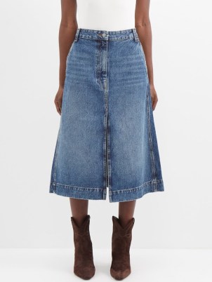 KHAITE Charlene front-slit denim skirt in blue – classic A-line split hem skirts – women’s casual designer fashion – matchesfashion - flipped