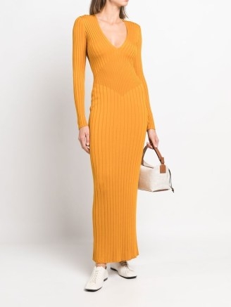 KHAITE Nicolai ribbed-knit maxi dress in bronze orange / long sleeved V-neck rib knit silk dresses / farfetch