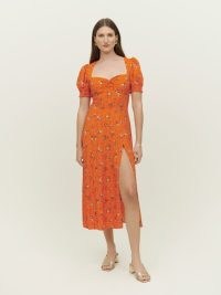 Reformation Lacey Dress in August / orange floral print sweetheart neckline dresses / high slit hem / fitted ruched bodice / short puffed sleeves / puff sleeve fashion