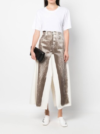 MM6 Maison Margiela slit-detail midi skirt in cream white | graphic jeans print | women’s printed designer skirts | FARFETCH | front and back split hem