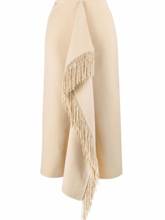 Nanushka blanket wrap skirt in cream beige | fringed front drape skirts | women’s designer fashion | FARFETCH - flipped