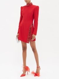 ANDREW GN Crystal-embellished crepe mini dress in red ~ long sleeved high neck dresses ~ asymmetric occasion fashion ~ padded shoulders for structure ~ women’s designer evening event clothes ~ slit hem ~ glamour ~ MATCHESFASHION