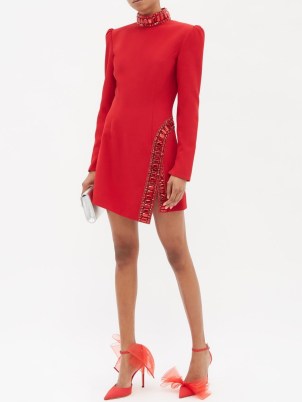 ANDREW GN Crystal-embellished crepe mini dress in red ~ long sleeved high neck dresses ~ asymmetric occasion fashion ~ padded shoulders for structure ~ women’s designer evening event clothes ~ slit hem ~ glamour ~ MATCHESFASHION