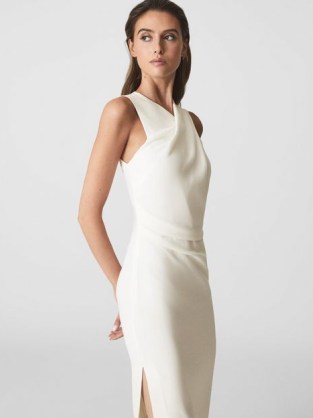 REISS IMOGEN SLEEVELESS RUCHED MIDI DRESS IVORY ~ chic sleevelss drape front occasion dresses ~ sophisticated evening look ~ alluring slit hem event wear ~ ruched detailing ~ refined party clothes ~ off white event clothing - flipped