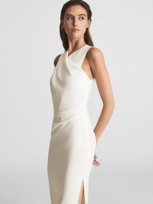 REISS IMOGEN SLEEVELESS RUCHED MIDI DRESS IVORY ~ chic sleevelss drape front occasion dresses ~ sophisticated evening look ~ alluring slit hem event wear ~ ruched detailing ~ refined party clothes ~ off white event clothing