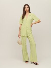 Reformation Ritzy Two Piece in Kiwi ~ women’s light green short sleeved top and trouser set ~ womens on-trend fashion sets ~ stylish trousers and tops co-ords